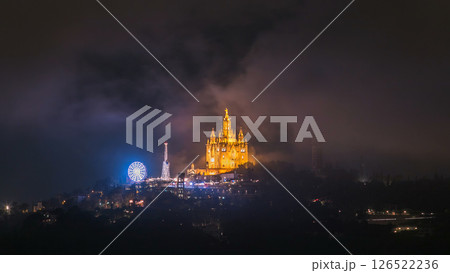 Temple of the Sacred Heart of Jesus timelapse on Tibidabo Mountain in Barcelona in clouds, Catalonia, Spain Temple of the Sacred Heart of Jesus timelapse on Tibidabo Mountain in Barcelona in clouds, Catalonia, Spain 126522236