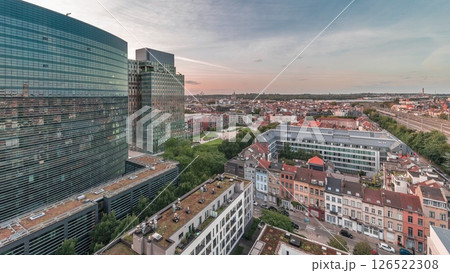 Aerial timelapse of Brussels urban landscape blending office skyscrapers with residential areas. 126522308