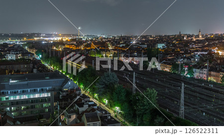 Aerial night timelapse of Brussels North station railway tracks with trains arriving and departing. Belgium Aerial night timelapse of Brussels North station railway tracks with trains arriving and departing. Belgium 126522311