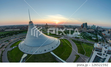 Elevated view with sunrise over the city center with Khan Shatyr and central business district timelapse, Kazakhstan, Astana Elevated view with sunrise over the city center with Khan Shatyr and central business district timelapse, Kazakhstan, Astana 126522392