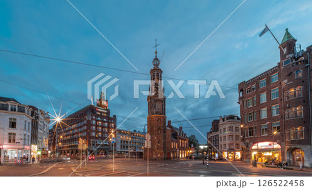 Munttoren tower and flowers market. Panoramic day to night timelapse hyperlapse of Amsterdam city center. Netherlands Munttoren tower and flowers market. Panoramic day to night timelapse hyperlapse of Amsterdam city center. Netherlands 126522458