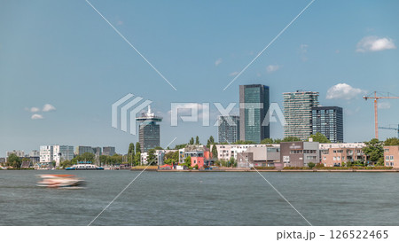 Timelapse of the most fashionable modern towers in Amsterdam, located in the city center on the Hey embankment. Netherlands Timelapse of the most fashionable modern towers in Amsterdam, located in the city center on the Hey embankment. Netherlands 126522465