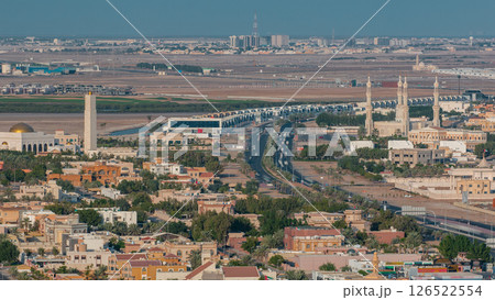 Cityscape of Ajman from rooftop with modern buildings timelapse. Cityscape of Ajman from rooftop with modern buildings timelapse. 126522554
