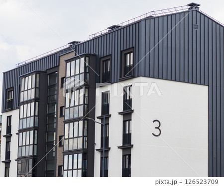 Shot of the stylish, modern, urban, residential suburb where buildings have ergonomic design and vivid colors Shot of the stylish, modern, urban, residential suburb where buildings have ergonomic design and vivid colors 126523709