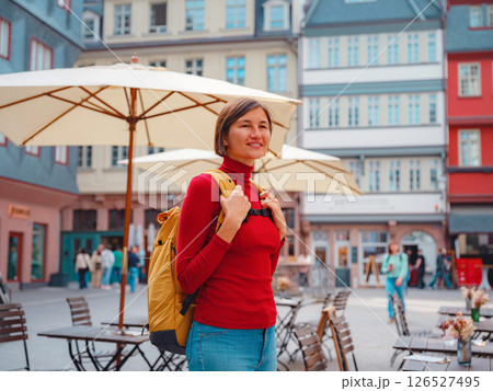 woman walks through old town of Frankfurt 126527495