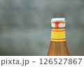 close up view of dirty tomato bottle cap with sauce from using in daily life 126527867