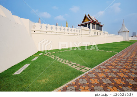 One wall of the inner palace is the Temple of the Emerald Buddha. 126528537