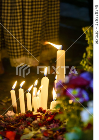 Candles and flowers Candles and flowers 126528548