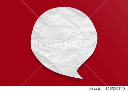 White speech bubble crumpled paper isolated on red background White speech bubble crumpled paper isolated on red background 126529140