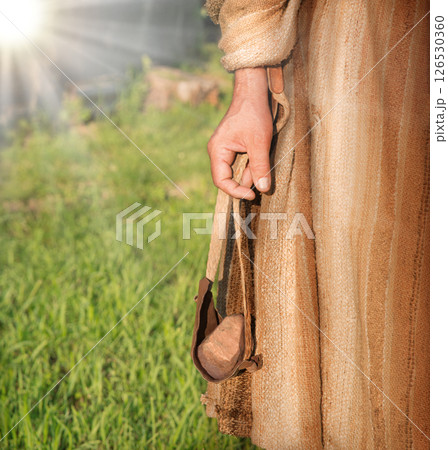 Ancient man with a sling 126530360
