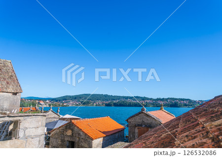 Scenic views of traditional buildings and coastal landscape. Combarro, Spain. Scenic views of traditional buildings and coastal landscape. Combarro, Spain. 126532086