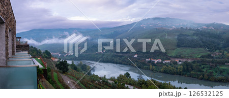 Panoramic view of Douro River valley with vineyards from hotel terrace. 126532125