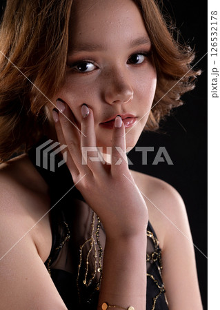 This is an Elegant Portrait of a Woman showcasing a Glamorous Touch that captivates viewers This is an Elegant Portrait of a Woman showcasing a Glamorous Touch that captivates viewers 126532178