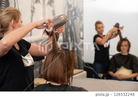 Enjoy a Hair Salon Styling Session Full Professional Hairdressing in Action Today Enjoy a Hair Salon Styling Session Full Professional Hairdressing in Action Today 126532248