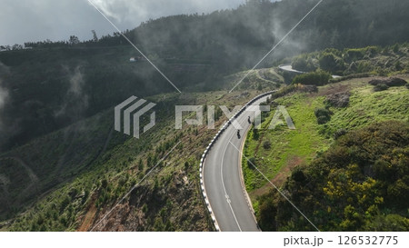 Motorcycle Rider Driving in High Mountain Landscape, Madeira Island , Portugal 126532775