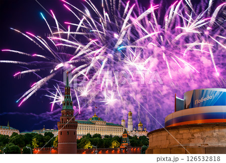 Moscow Kremlin (with decorations for the holiday of May 9 ) and fireworks in honor of Victory Day celebration (WWII), Russia-- the most popular view. Translation: Victory 126532818