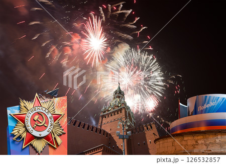 Moscow Kremlin (with decorations for the holiday of May 9 ) and fireworks in honor of Victory Day celebration (WWII), Russia-- the most popular view. Translation: Victory, Patriotic war 126532857
