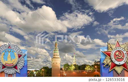 Moscow Kremlin (with orders of victory)--Victory Day celebration (WWII), Russia-- the most popular view. Against the sky with clouds. English translation from Russian: USSR, Victory, Patriotic war Moscow Kremlin (with orders of victory)--Victory Day celebration (WWII), Russia-- the most popular view. Against the sky with clouds. English translation from Russian: USSR, Victory, Patriotic war 126533016