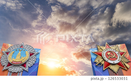 Orders of victory in honor of Victory Day celebration (WWII), Red Square, Moscow, Russia. Against the clouds. Translation from Russian: USSR, Victory, Patriotic war Orders of victory in honor of Victory Day celebration (WWII), Red Square, Moscow, Russia. Against the clouds. Translation from Russian: USSR, Victory, Patriotic war 126533031