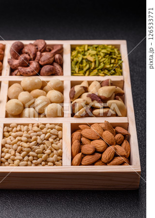 Mix of macadamia, pine, cashew, hazelnut, peanut, pistachio nuts Mix of macadamia, pine, cashew, hazelnut, peanut, pistachio nuts 126533771