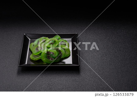 Dried sweet green kiwi or candied fruit Dried sweet green kiwi or candied fruit 126533879