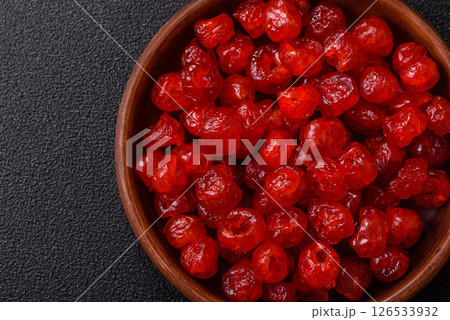 Dried sweet red pitted cherries or candied fruits Dried sweet red pitted cherries or candied fruits 126533932