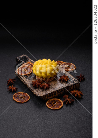 Round sweet tart of yellow color with citrus and passion fruit flavor Round sweet tart of yellow color with citrus and passion fruit flavor 126534022