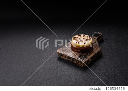 Sweet round tart three chocolates 126534226