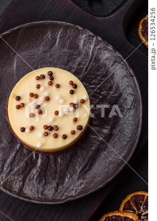 Sweet round tart three chocolates 126534256