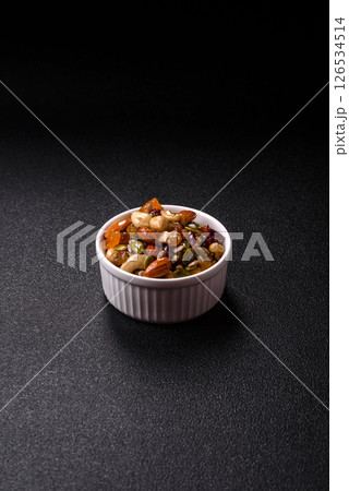 Honeyed cashew nuts, walnuts, hazelnuts, pine nuts and dried fruits Honeyed cashew nuts, walnuts, hazelnuts, pine nuts and dried fruits 126534514