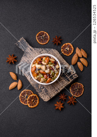 Honeyed cashew nuts, walnuts, hazelnuts, pine nuts and dried fruits Honeyed cashew nuts, walnuts, hazelnuts, pine nuts and dried fruits 126534525
