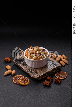 Honeyed cashew nuts, walnuts, hazelnuts, pine nuts and dried fruits 126534526