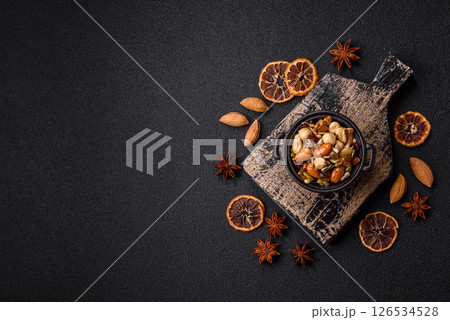 Honeyed cashew nuts, walnuts, hazelnuts, pine nuts and dried fruits Honeyed cashew nuts, walnuts, hazelnuts, pine nuts and dried fruits 126534528