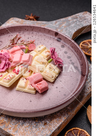 Multicolored handmade chocolate bars pink, white, brown colors Multicolored handmade chocolate bars pink, white, brown colors 126534641