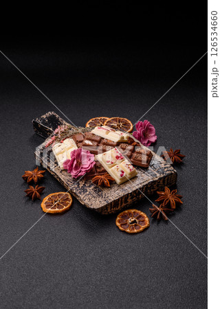 Multicolored handmade chocolate bars pink, white, brown colors 126534660