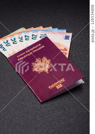 France citizen passport against the background of the France national flag France citizen passport against the background of the France national flag 126534806