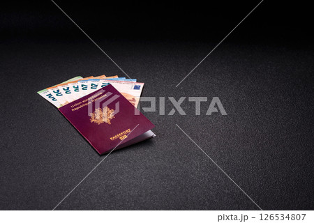 France citizen passport against the background of the France national flag France citizen passport against the background of the France national flag 126534807