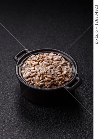 Peeled sunflower seeds in a bowl, an ingredient for making vegetarian food Peeled sunflower seeds in a bowl, an ingredient for making vegetarian food 126534923