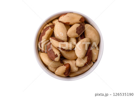 Brazil nut kernels in ceramic bowl 126535190