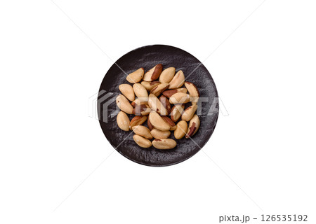Brazil nut kernels in ceramic bowl 126535192