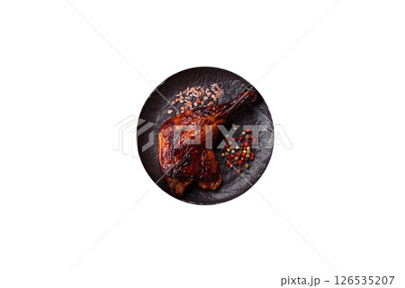Duck, chicken leg or thigh grilled on a white background Duck, chicken leg or thigh grilled on a white background 126535207