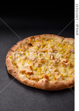 Hawaiian pizza with chicken, pineapple, corn and cheese Hawaiian pizza with chicken, pineapple, corn and cheese 126535233