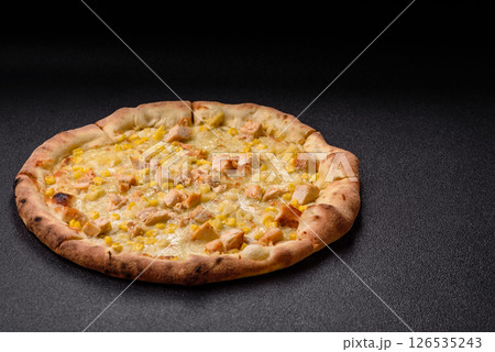 Hawaiian pizza with chicken, pineapple, corn and cheese 126535243