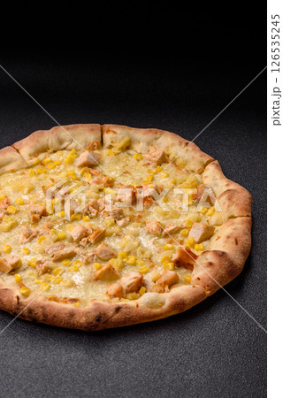 Hawaiian pizza with chicken, pineapple, corn and cheese Hawaiian pizza with chicken, pineapple, corn and cheese 126535245