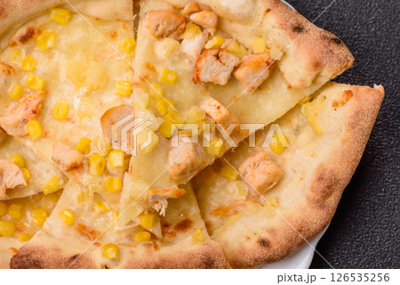 Hawaiian pizza with chicken, pineapple, corn and cheese Hawaiian pizza with chicken, pineapple, corn and cheese 126535256