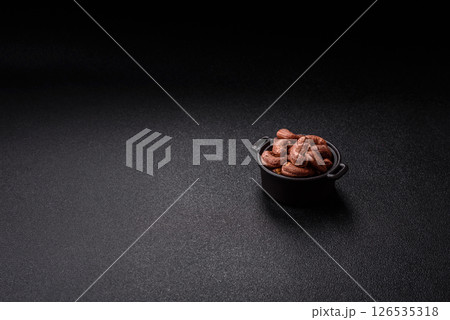Cashew nuts in shell in bowl 126535318