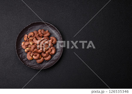 Cashew nuts in shell in bowl Cashew nuts in shell in bowl 126535346