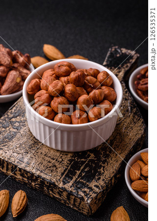 Raw hazelnuts without shells in a bowl Raw hazelnuts without shells in a bowl 126535371