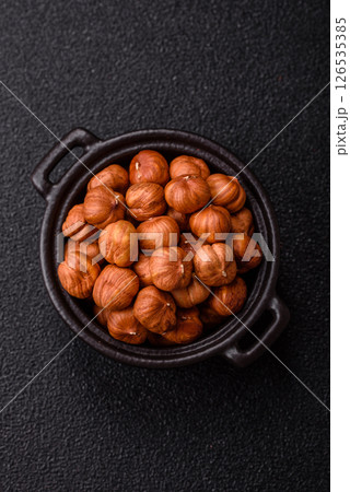 Raw hazelnuts without shells in a bowl Raw hazelnuts without shells in a bowl 126535385
