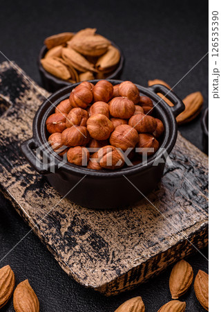 Raw hazelnuts without shells in a bowl 126535390